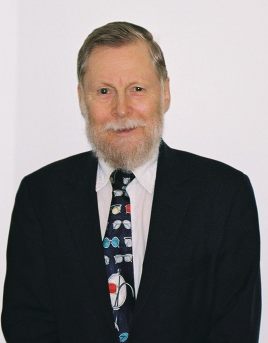Roger D. Moore with blazer & necktie